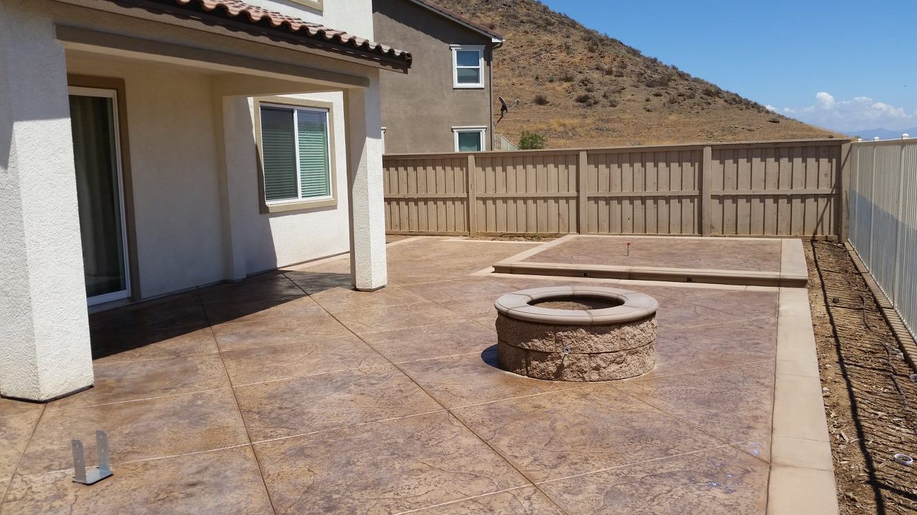 This is a concrete patio we installed with sandstone coloring